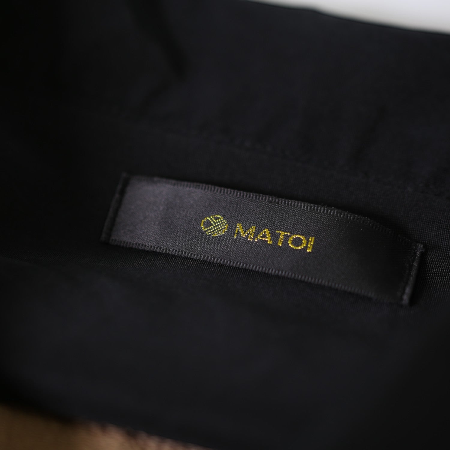 A habutae silk shirt worn with a black formal kimono