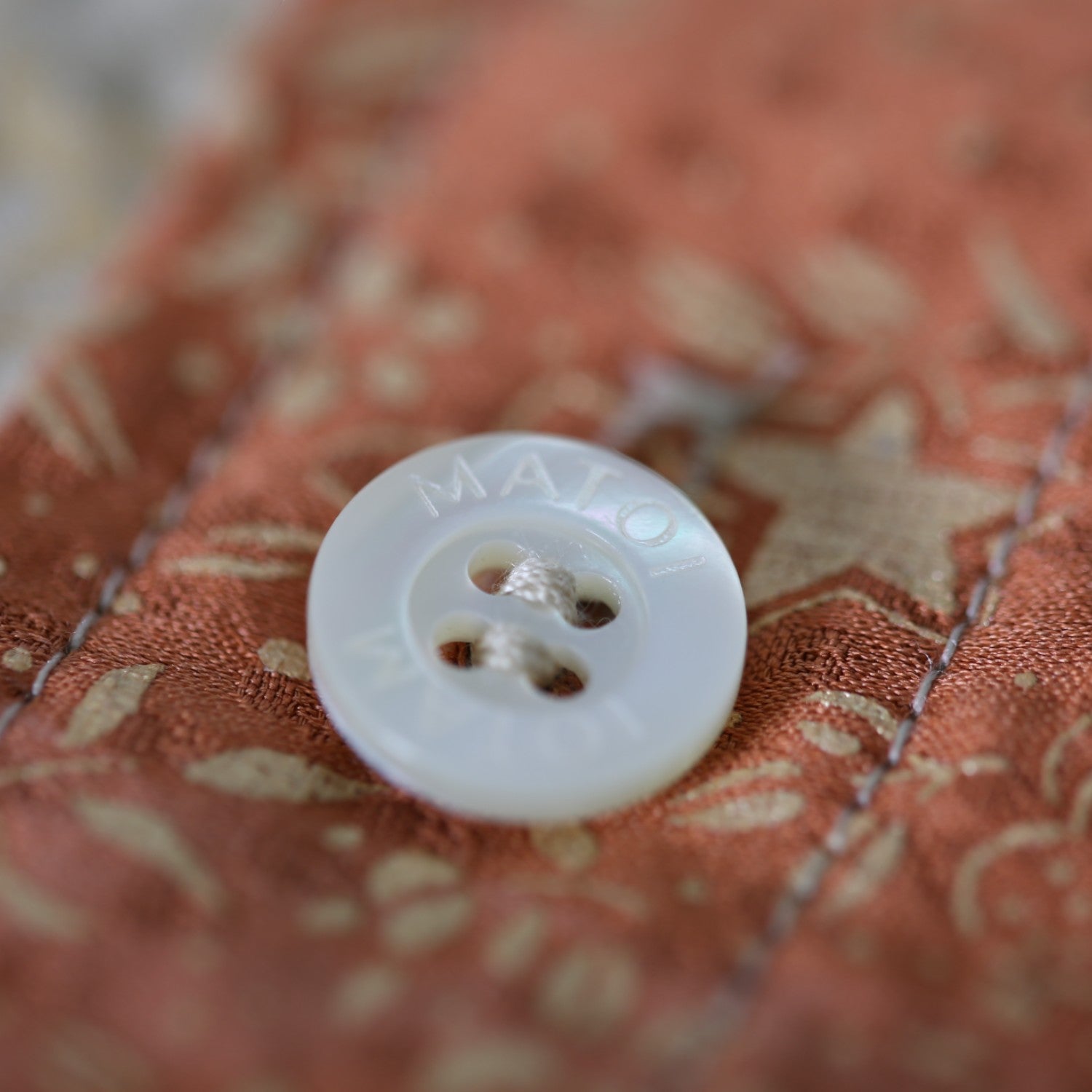 A floral silk shirt worn with a formal kimono