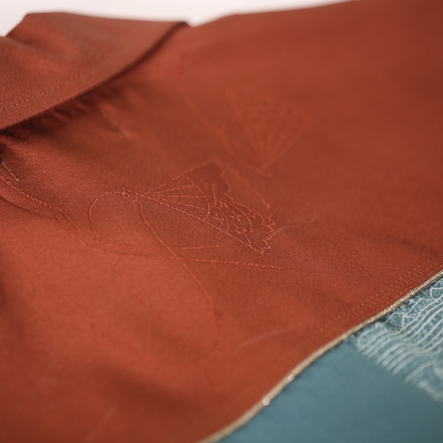 Traditional beauty: Silk shirt with festival scene pattern