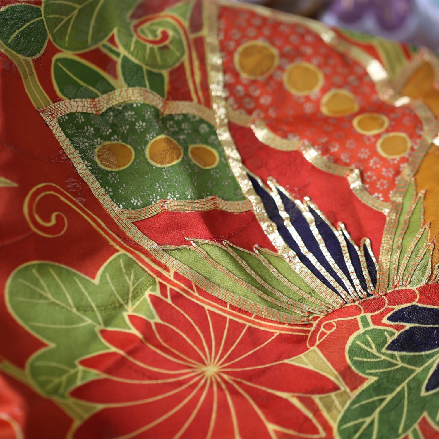 Glossy red furisode and Saga Nishiki pants