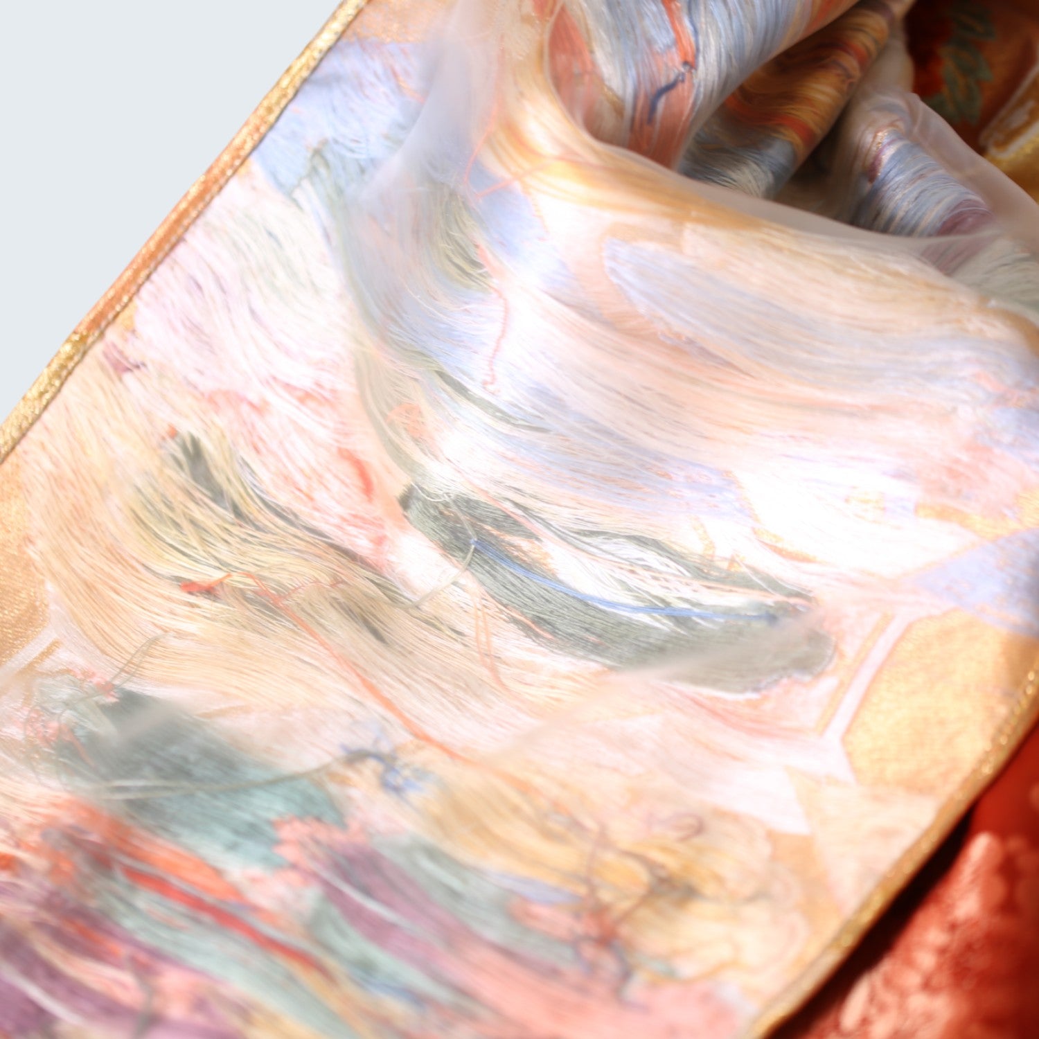 Glossy red furisode and Saga Nishiki pants