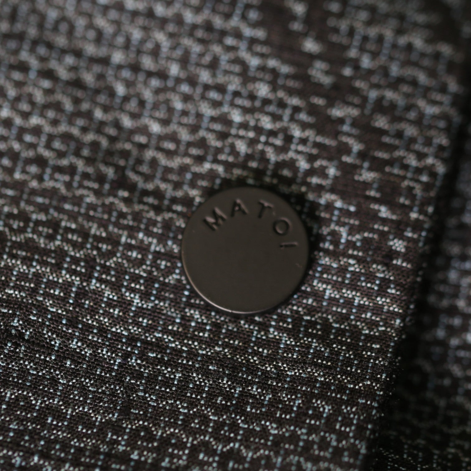 A glossy haori coat made from authentic Yuki Tsumugi silk