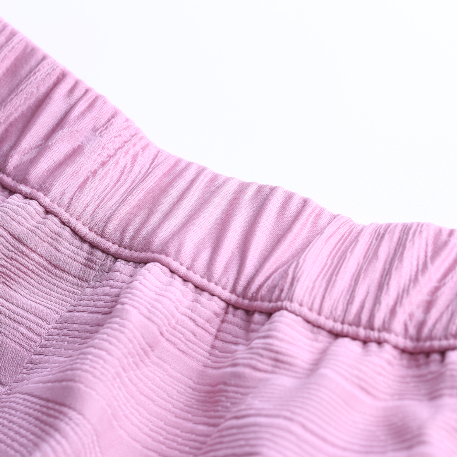 A pink skirt with weeping cherry blossoms and butterflies dancing