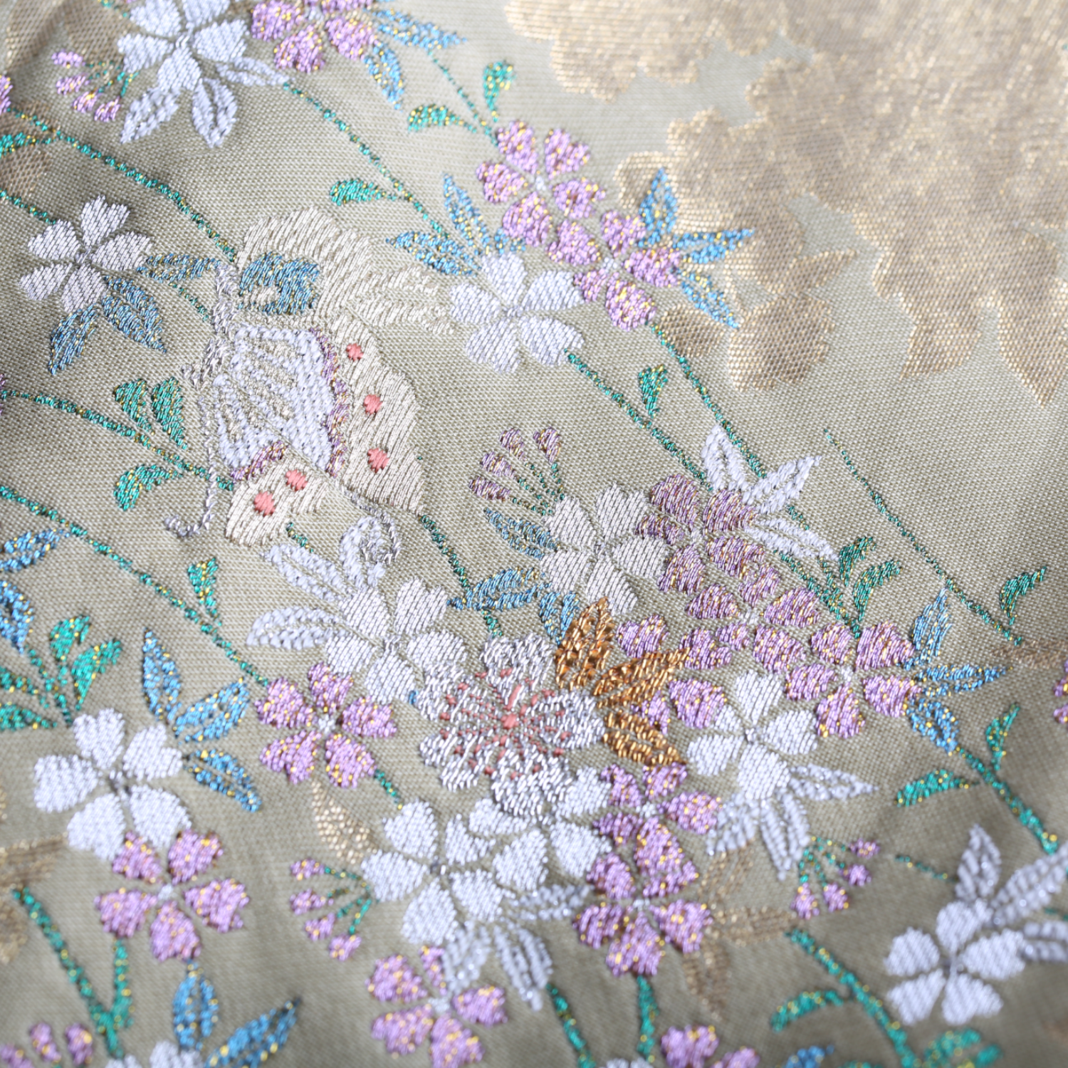 A pink skirt with weeping cherry blossoms and butterflies dancing