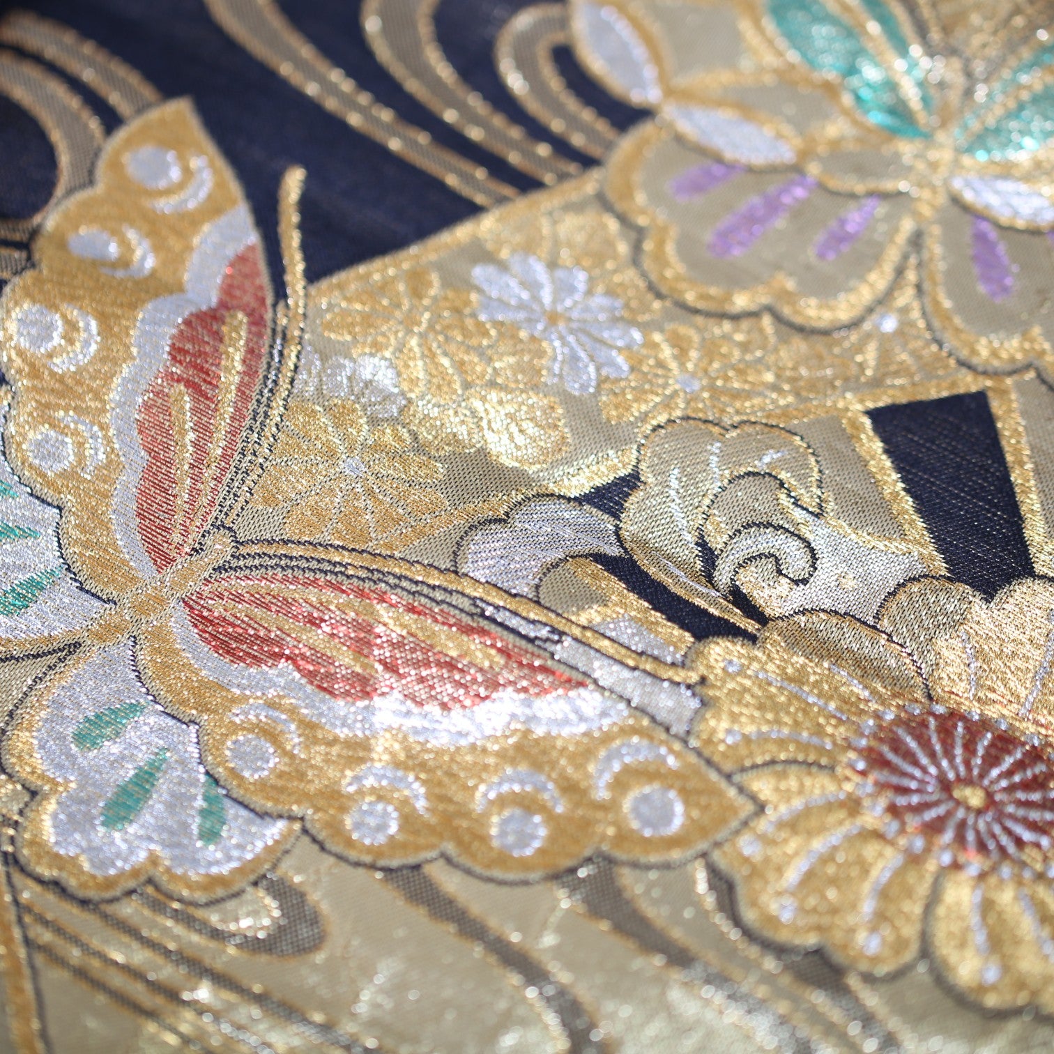 A dignified skirt in jet black and gold with butterflies fluttering about