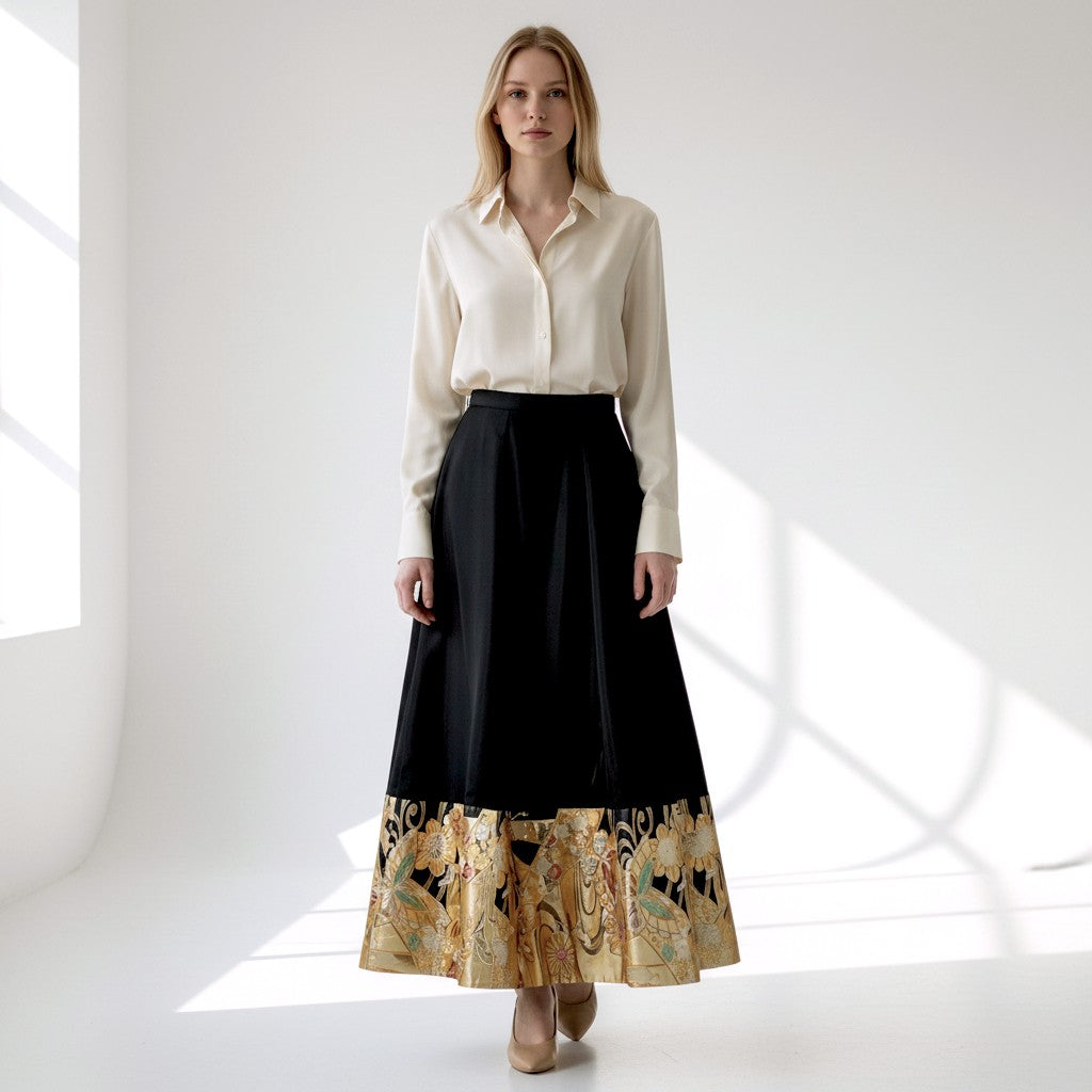 A dignified skirt in jet black and gold with butterflies fluttering about