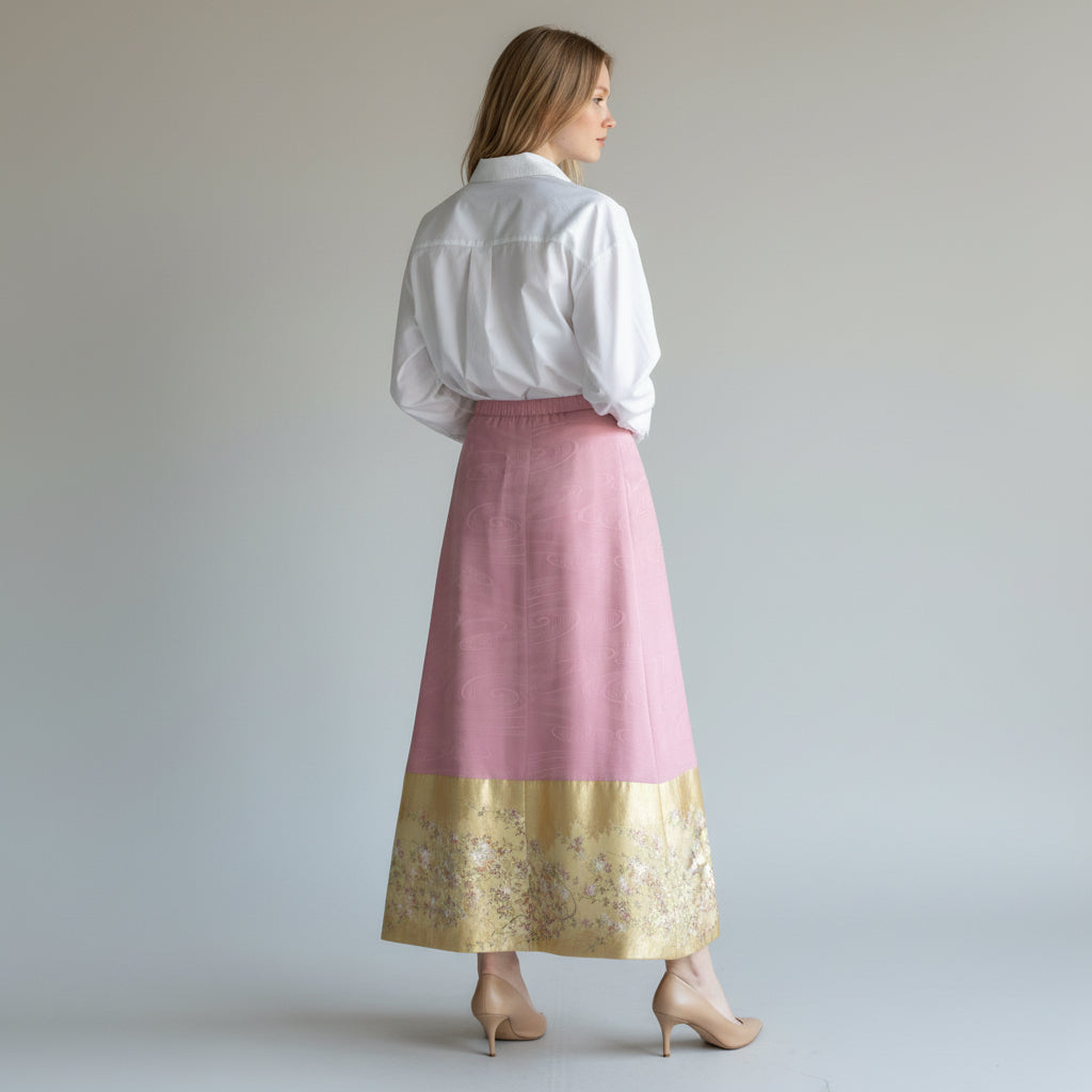A pink skirt with weeping cherry blossoms and butterflies dancing