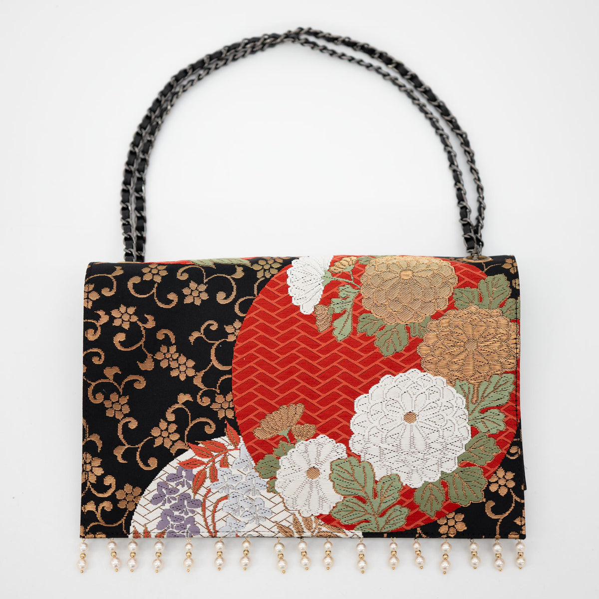 Clutch bag crafted from a vintage obi, adorned with the brilliance of the wisteria crest.